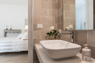 Heima Levante 23 Bagno camera grigia web
